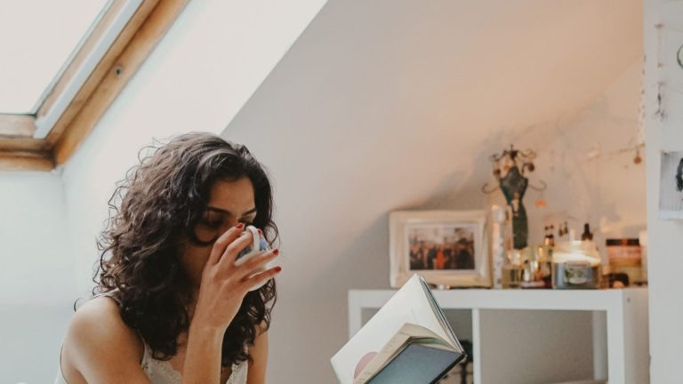 For some women, self care can be as simple as having a cup of coffee and reading a good book.